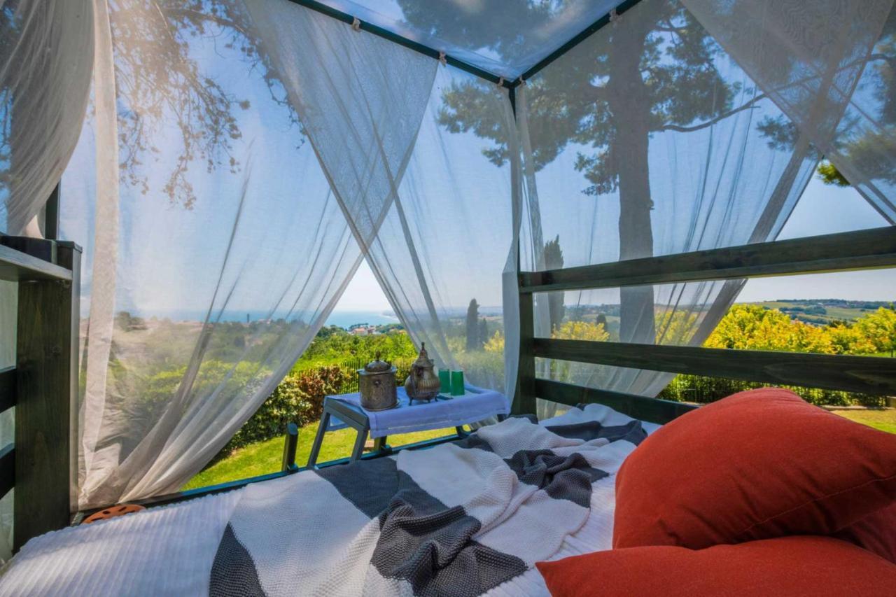 Tra Gli Alberi E Il Mare Acomodação com café da manhã Sirolo Exterior foto